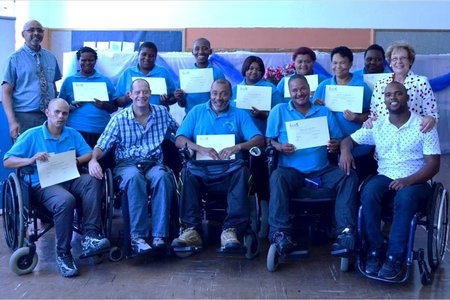 Graduates of OAPD's Peer Support Training Course pictured with Executive Mayor, Nicolette Botha-Guthrie (far right standing) and Principal of Hawston Secondary School and OAPD Chairperson, Idy Adams (far left standing). Also in attendance were ARRC Trainer, Jacques Lloyd (front row, seated second from left); OAPD Coordinator Peer Support, Lionel Isaacs (front row, seated centre) and ARRC Trainer, Sherwin Gerwil (front row, seated far right)